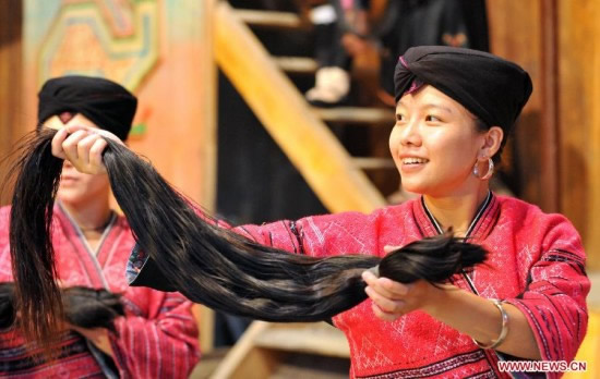 mujeres Huangluo pelo