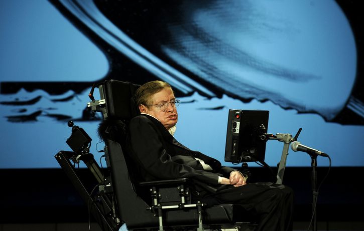 Stephen Hawking sentado planetas