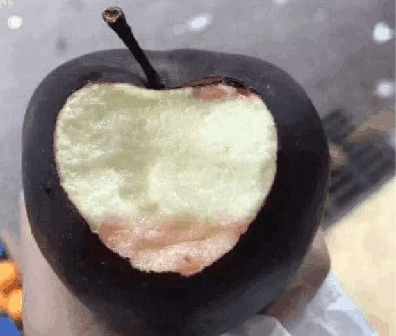 manzana diamente negro mordida