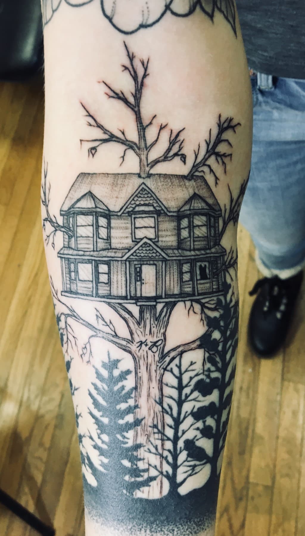 tatuaje de la casa familiar