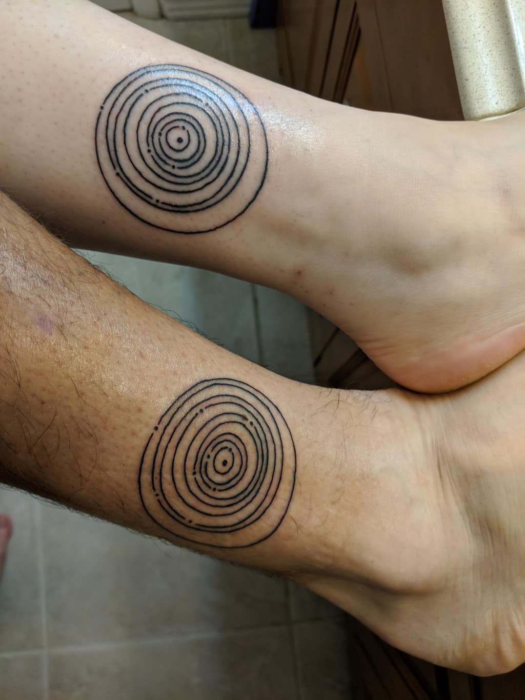 tatuajes en pareja posición planetas